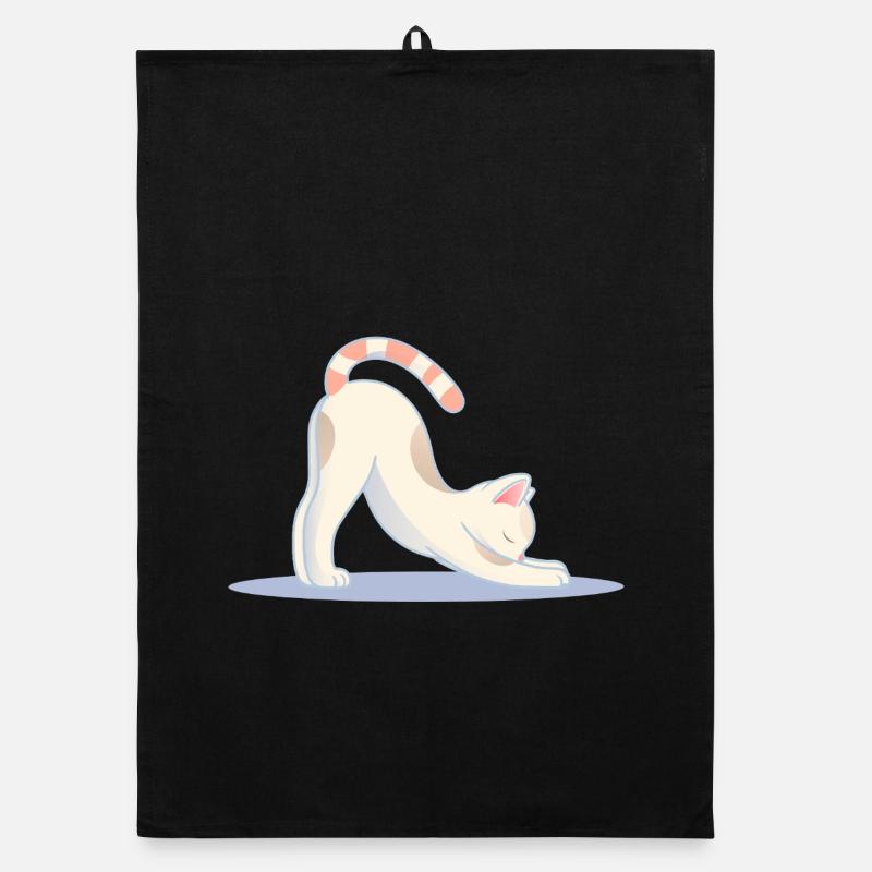 chat mignon dans une pose d’étirement de yoga classique Torchon bio
