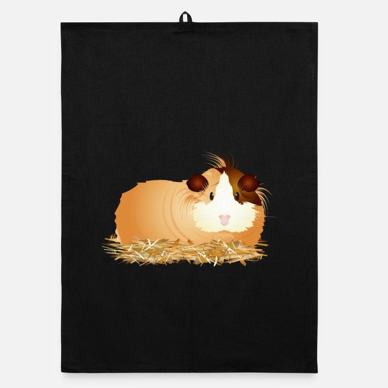 Cochon d’Inde mignon allongé confortablement dans la paille Torchon bio