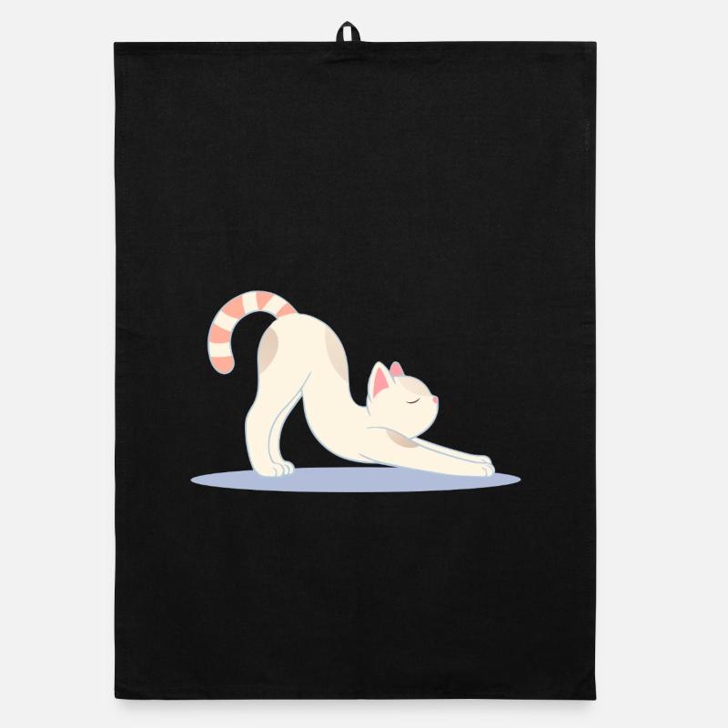 chat mignon dans une pose d’étirement de yoga classique Torchon bio