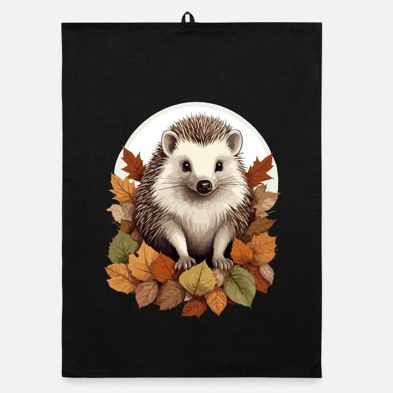 Hérisson mignon dans un tas de feuilles Torchon bio