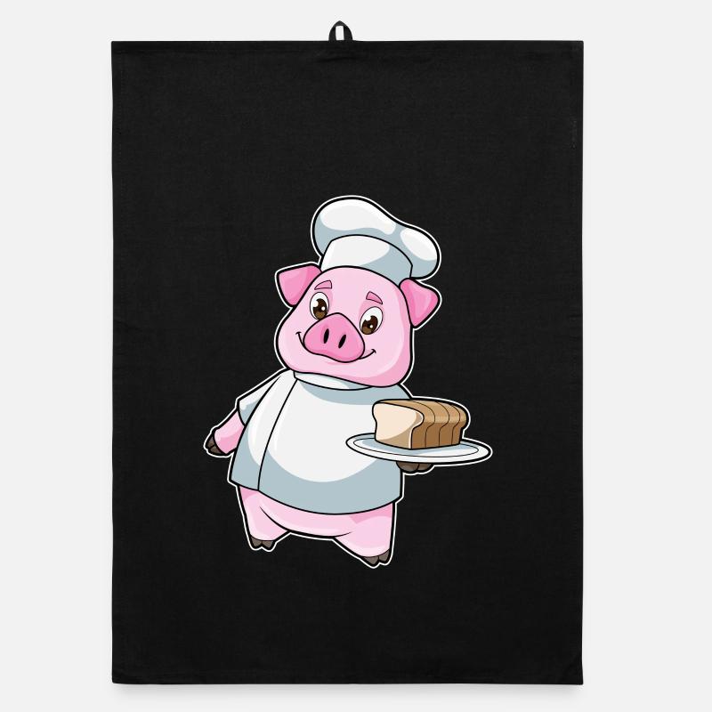 Cochon comme cuisinier avec un plateau et un gâteau Torchon bio