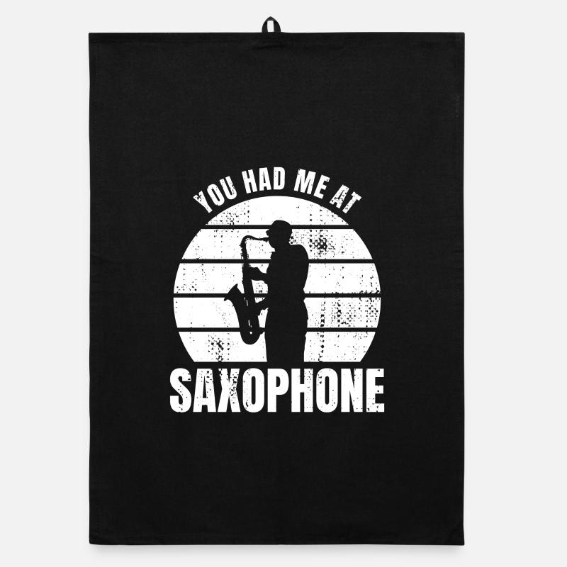 Tu m’as eu au saxophone Torchon bio