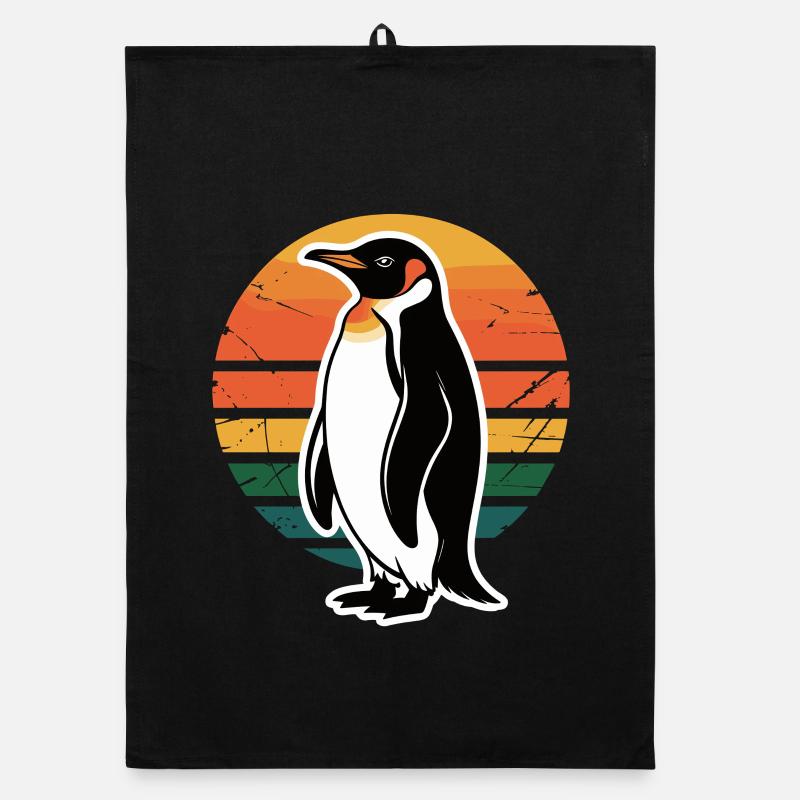 Silhouette de pingouin avec coucher de soleil Torchon bio