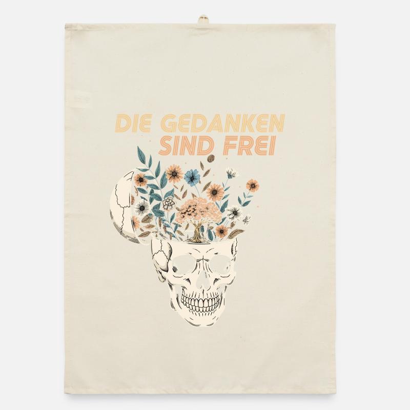 Fleurs dans le crâne avec un message Torchon bio