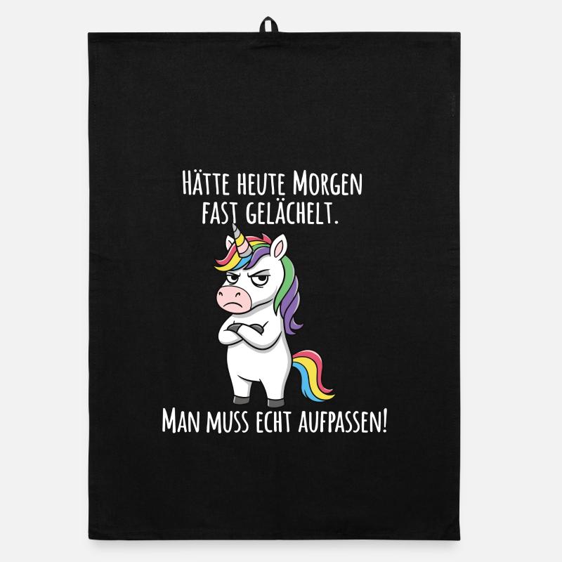 Fast gelächelt – Grummeliges Einhorn Morgenmuffel Torchon bio