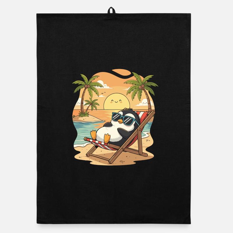 Penguin on the beach at sunset Organic dish towel