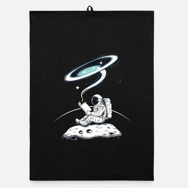 Reading astronaut in space on the moon with Organic dish towel