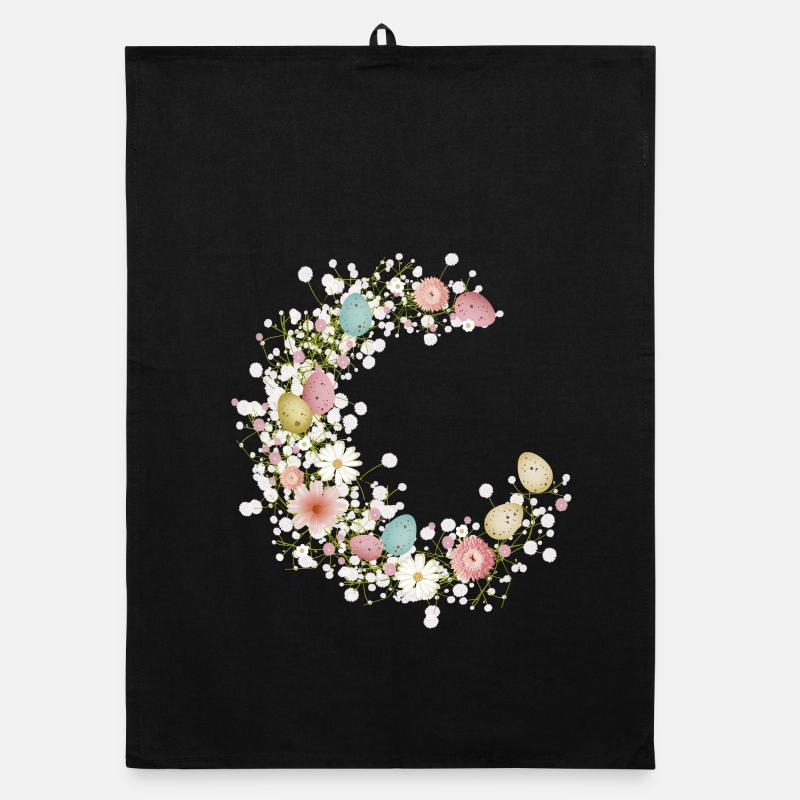 pastel-coloured Easter eggs, flowers and baby's breath Organic dish towel