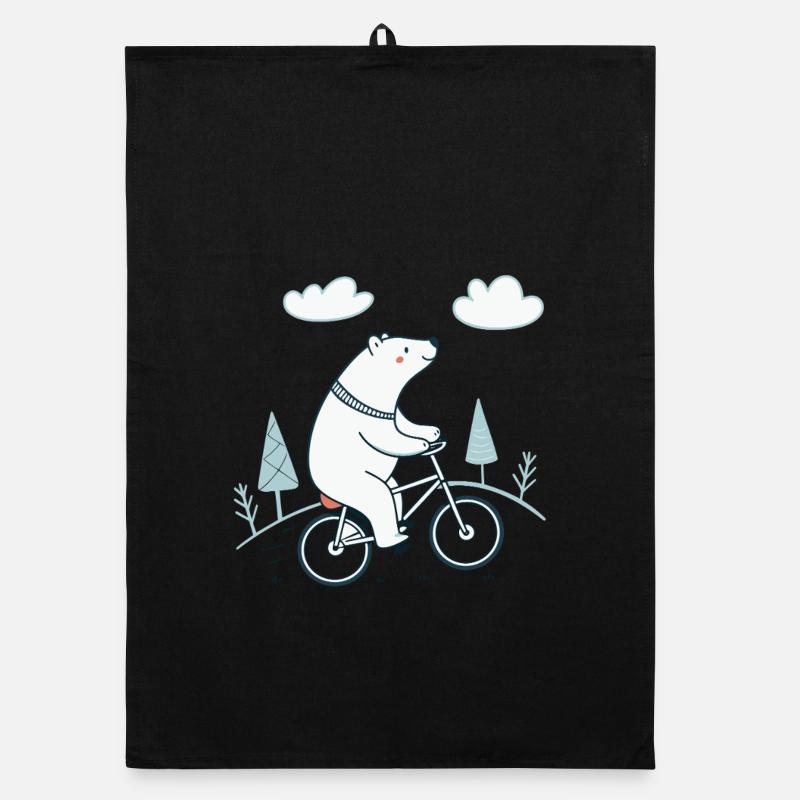 Ours blanc à vélo dans le paysage doux Torchon bio