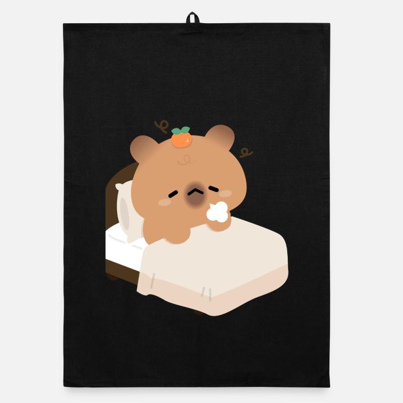 Capybara endormi dans un lit douillet Torchon bio