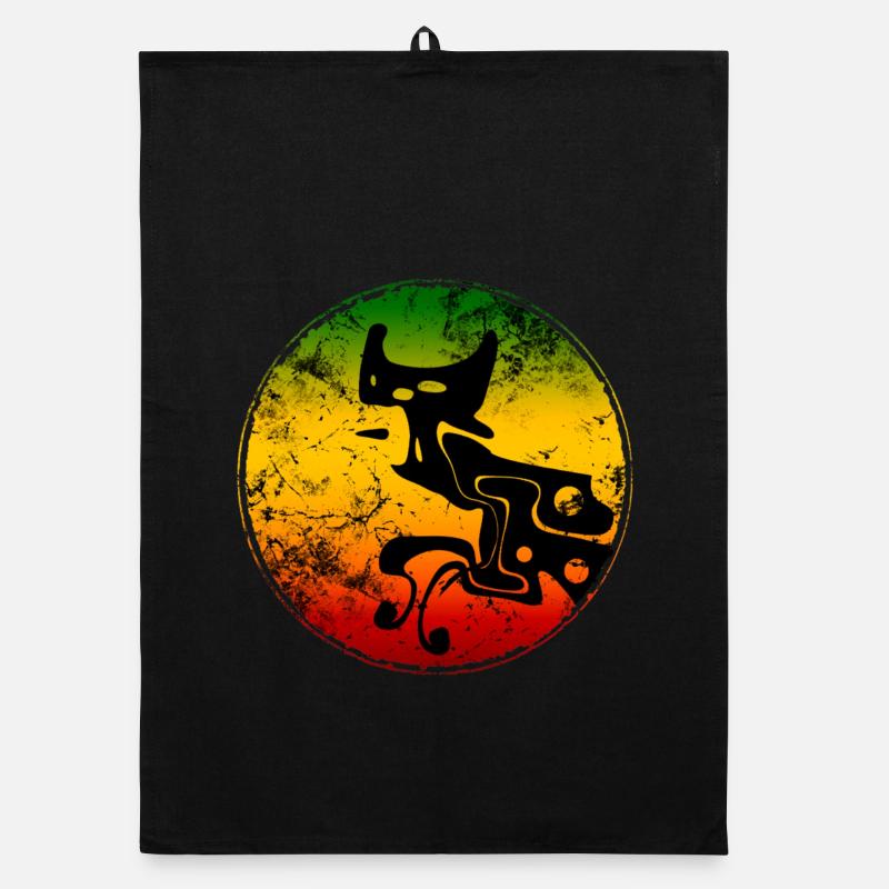 Silhouette abstraite de chat sauvage aux couleurs reggae Torchon bio