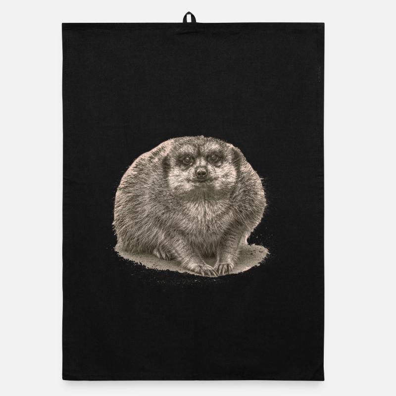 Suricate assis dans le sable Torchon bio