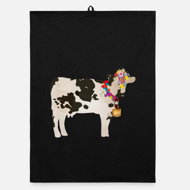 vache décorée avec cloche et décorations florales Torchon bio
