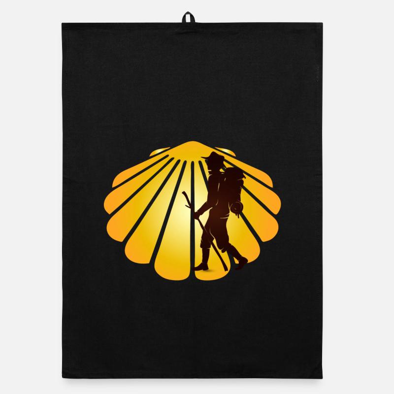 A pilgrim on a pilgrimage path with scallops Organic dish towel