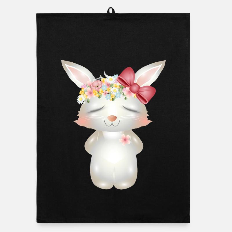 Lapin blanc mignon avec des fleurs et un arc Torchon bio