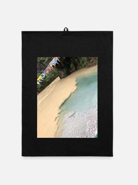 Tropical beach with colorful flags - Organic dish towel - black