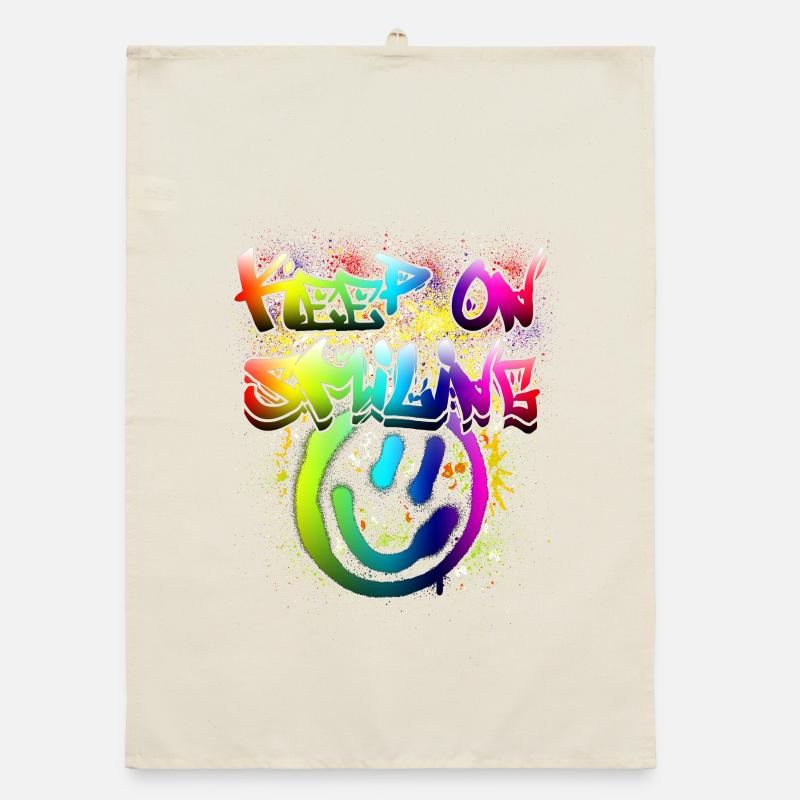 Conception de graffiti de visage heureux coloré Torchon bio