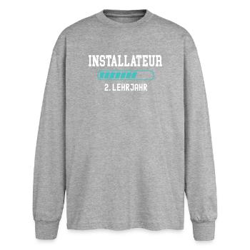 Apprentissage d’installateur 2e année d’apprentissage - T-shirt manches longues oversize - gris chiné - Devant - AI Model Female 180 light (180cm)