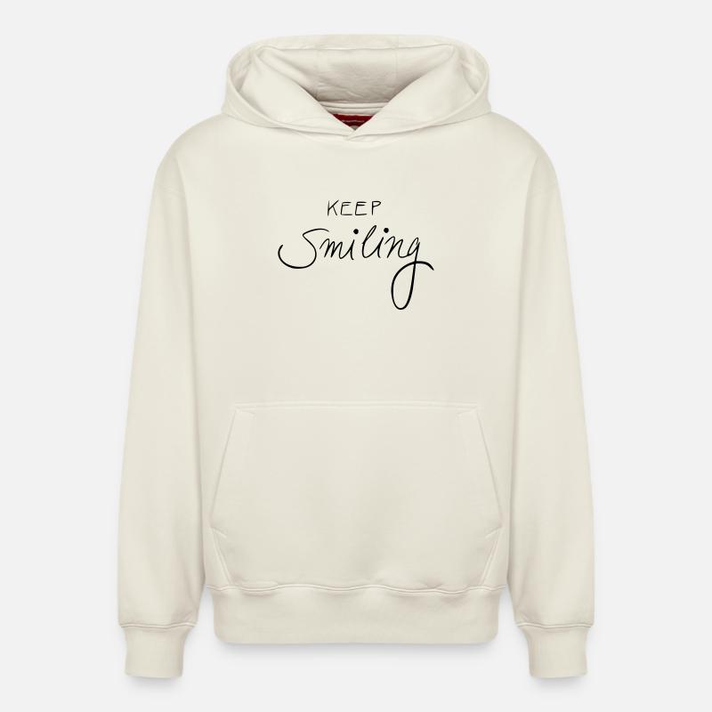 garde le sourire - Sweat à capuche unisexe décontracté en coton biologique – de SPREAD - blanc cassé
