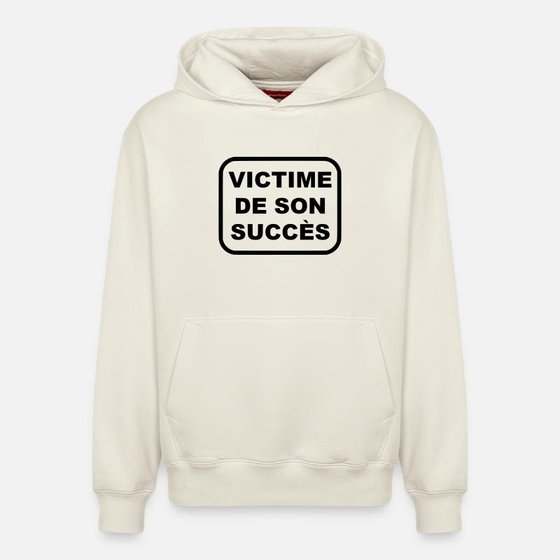 Victime de son succès - Sweat à capuche unisexe décontracté en coton biologique – de SPREAD - blanc cassé