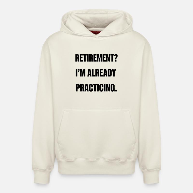 Retirement? I’m already practicing. - Sweat à capuche unisexe décontracté en coton biologique – de SPREAD - blanc cassé