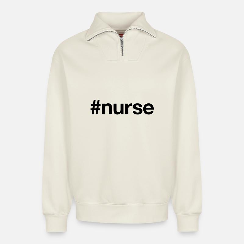 INFIRMIÈRE - Sweat unisexe décontracté en coton biologique à demi-zip – de SPREAD - blanc cassé