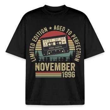 November 1996 - Boxy Heavyweight Unisex Organic T-Shirt by Stanley/Stella - black - Front - AI Model Male 185 light (185cm) & AI Model Female 172 dark (172cm)