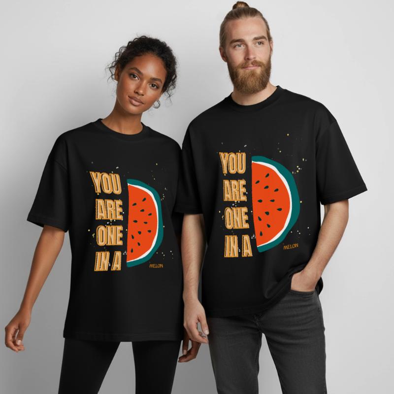 C’est drôle, tu es un dans une pastèque, pastèque, fruit de jeu de mots T-shirt unisexe boxy épais biologique Stanley/Stella