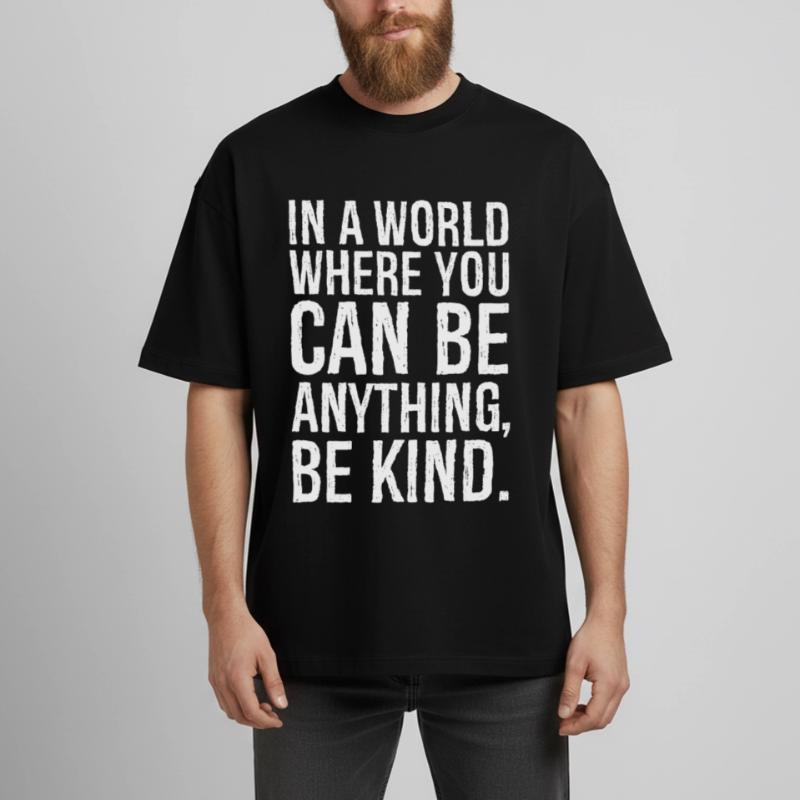 Dans un monde où l’on peut être n’importe quoi, être gentil T-shirt unisexe boxy épais biologique Stanley/Stella