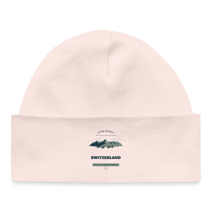 Switzerland badge on a baby organic beanie, pale pink