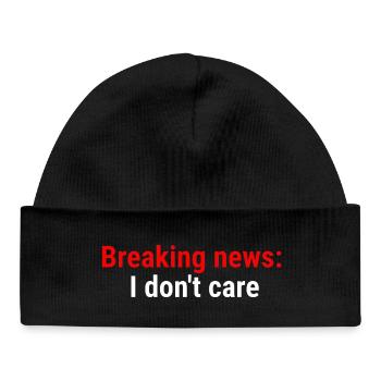 Breaking news: I don't care White - Baby Organic Beanie - black - Front