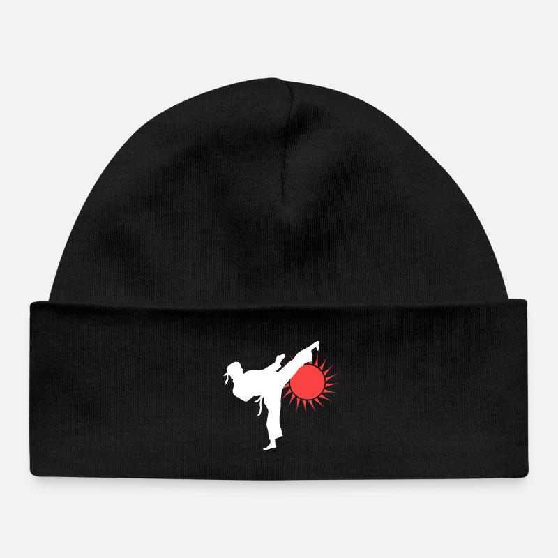 Silhouette de coup de pied de karaté avec soleil rouge - Bonnet bébé bio - noir