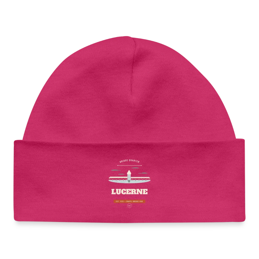 Lucerne badge on a baby organic beanie, hot pink