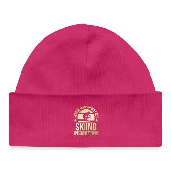 L’école est importante Le ski plus important - Bonnet bébé bio - hot pink - Devant