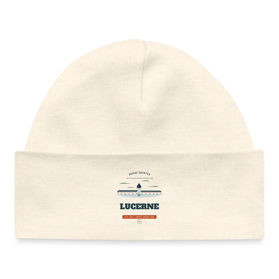 Lucerne badge on a baby organic beanie, soft Ecru