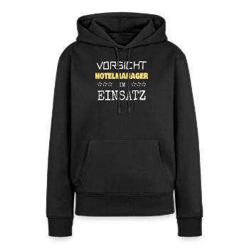 Nomination de directeur d’hôtel - Sweat à capuche Premium bio Femme - noir - Devant - Julia (174cm)