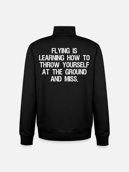 flying is learning how to throw yourself at the - Unisex Organic Zip Sweatshirt by Stanley/Stella - black