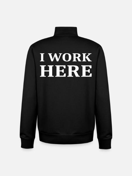 I work here - Unisex Organic Zip Sweatshirt by Stanley/Stella - black