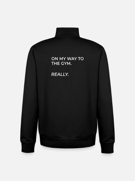 Sto andando in palestra – davvero - Felpa unisex con zip in cotone biologico di Stanley/Stella - nero