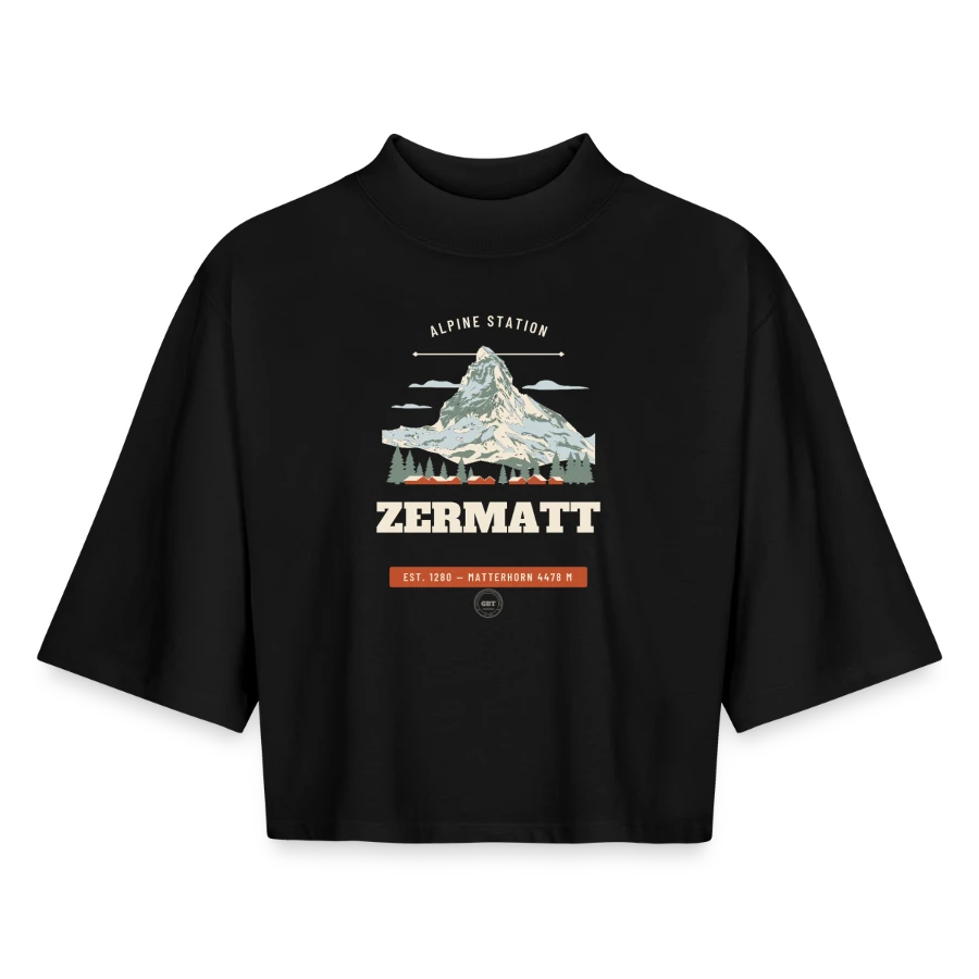 Zermatt badge on a boxy women's recycled 1/2 sleeved t-shirt by stanley/stella, black