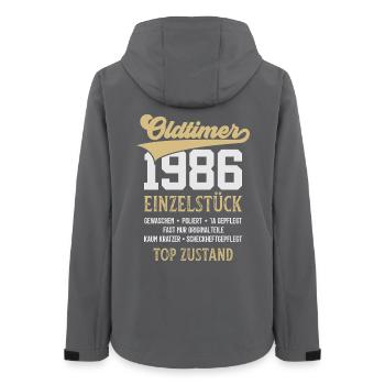 OLDTIMER 1986 EINZELSTÜCK 40. GEBURTSTAG - Frauen Recycelte Softshelljacke von Stanley/Stella - Anthrazit - Hinten - AI Model Female 172 light (172cm)