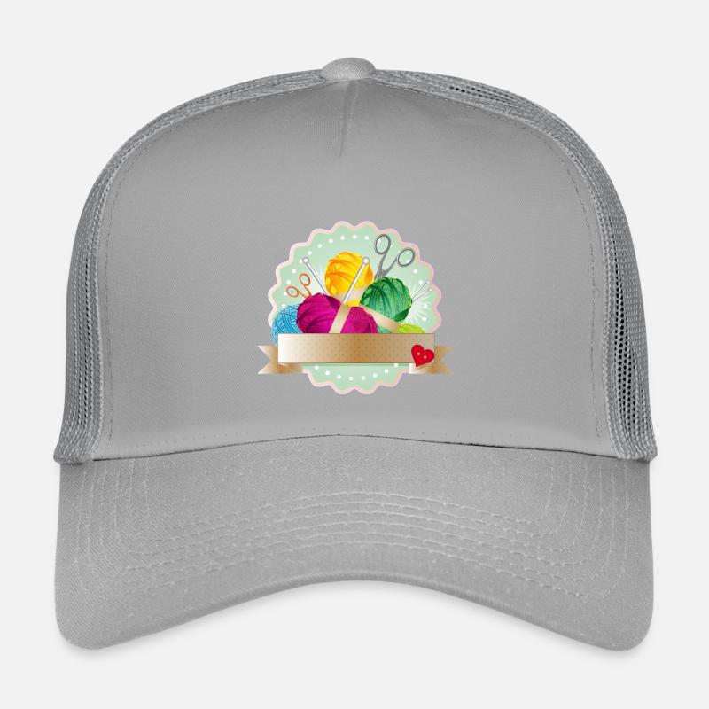 Balls of wool, button & knitting needles as a colorful patch Kids’ Trucker Cap