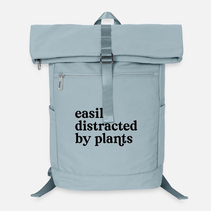 Facilement distraite par les plantes. Sac à dos ordinateur