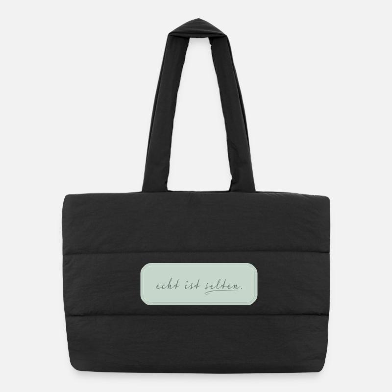 echt ist selten – minimalistische Typografie - Puffer-Einkaufstasche - Schwarz