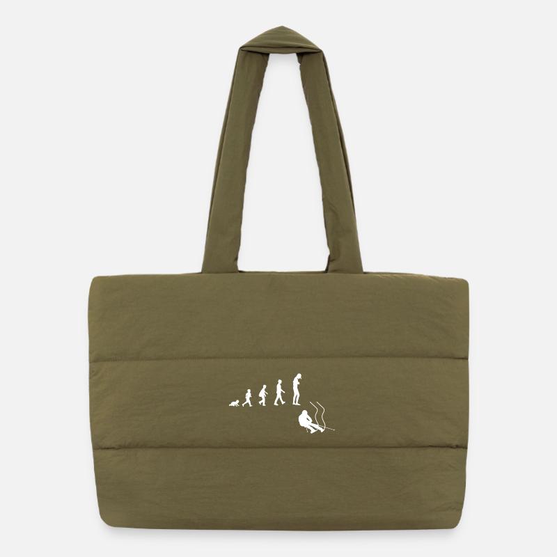 Evolution from baby to downhill skier Puffer Shopping Bag