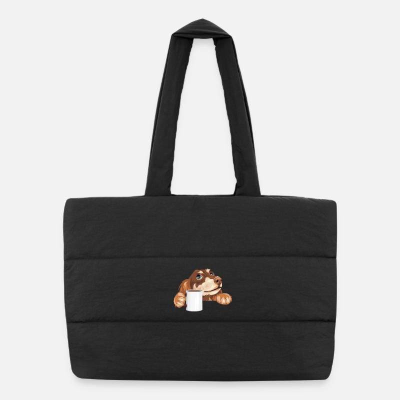Teckel rêveur jetant un coup d’œil avec une tasse Sac shopping matelassé