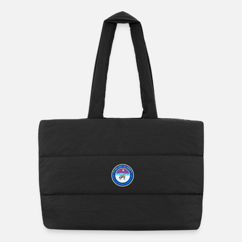 A wolf's eyes appear to glow at night Puffer Shopping Bag