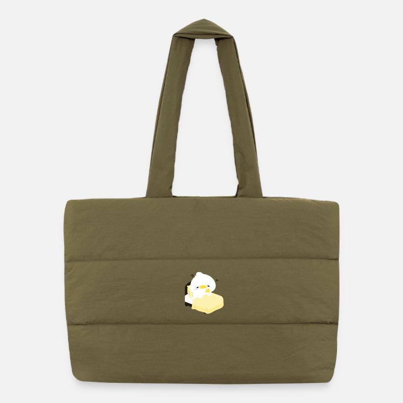 Canard douillet et endormi sur un lit jaune Sac shopping matelassé