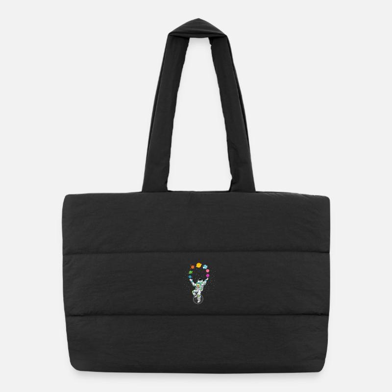 Chemise d’astronaute jonglant avec les planètes Sac shopping matelassé
