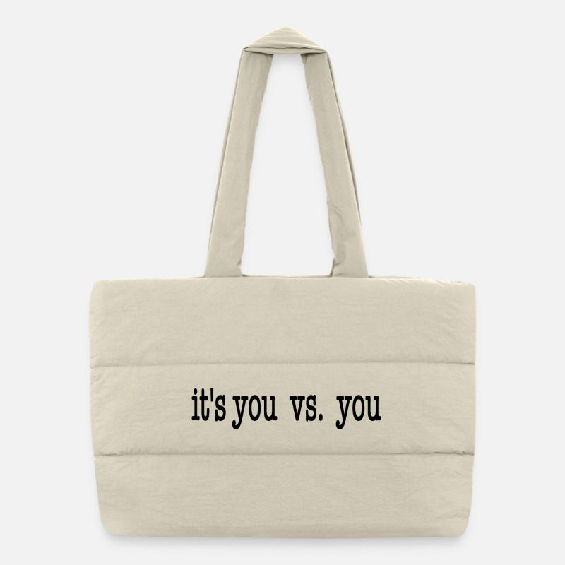 it's you vs. you - schwarz Puffer-Einkaufstasche